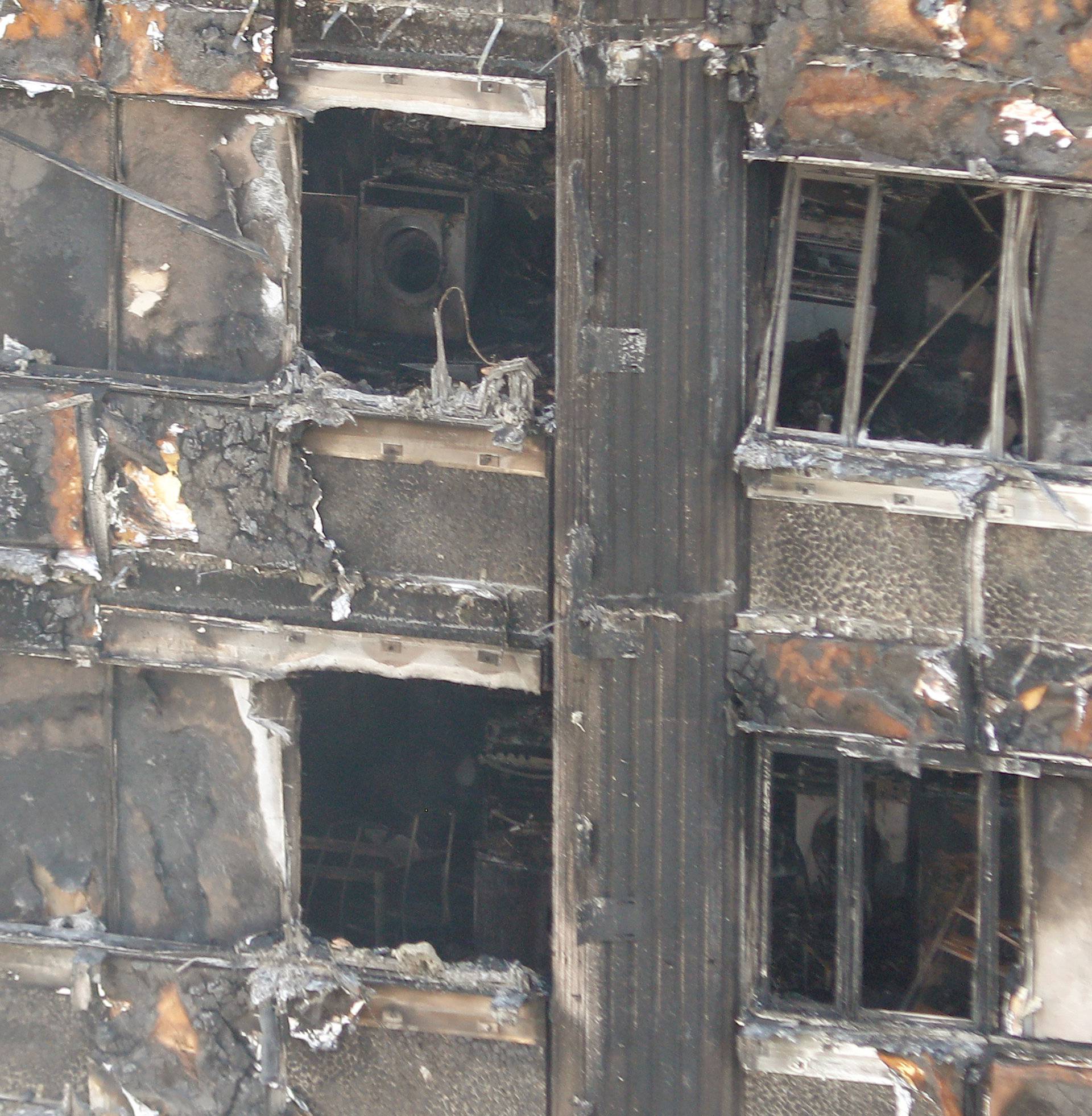 The extensive damage is seen to the Grenfell Tower block that was destroyed in a fire disaster, in north Kensington, West London