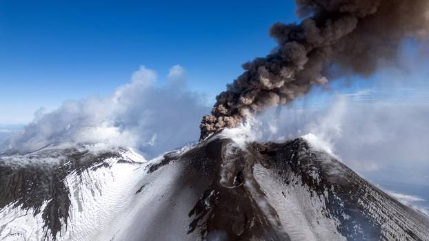 Italy's Mount Etna erupts