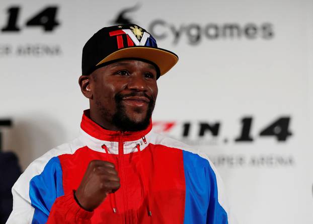 Undefeated boxer Floyd Mayweather Jr. of the U.S. attends a news conference inn Tokyo