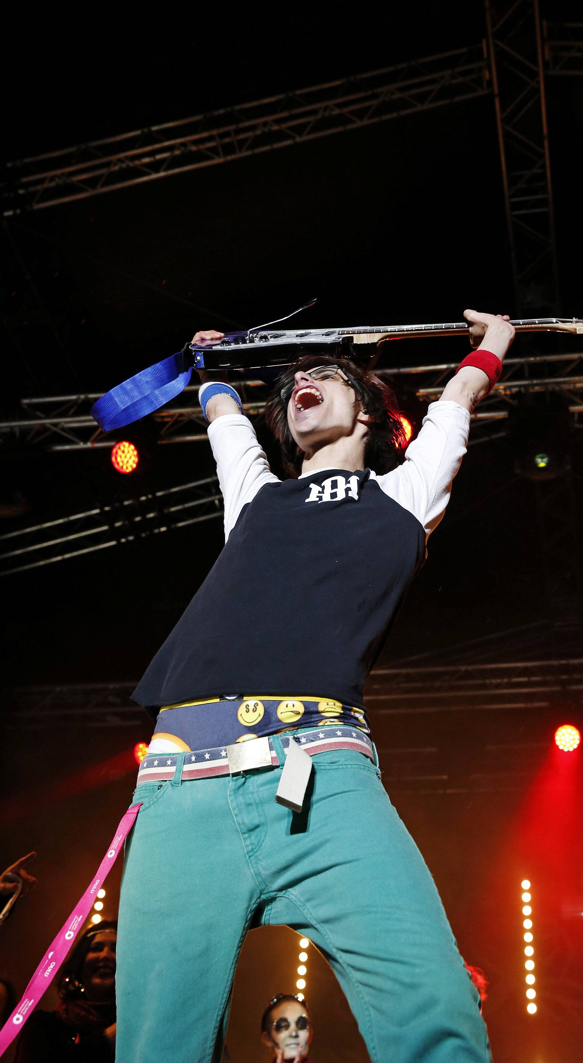 Winner Matt "Airistotle" Burns of the U.S. celebrates during the final of the Air Guitar World Championships in Oulu