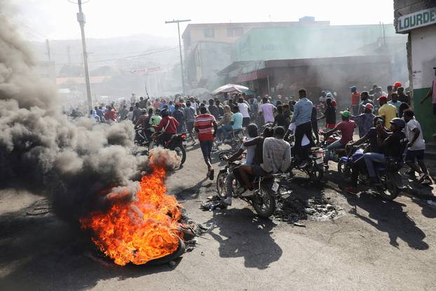 Haitians protest against Prime Minister Ariel Henry, in Port-au-Prince