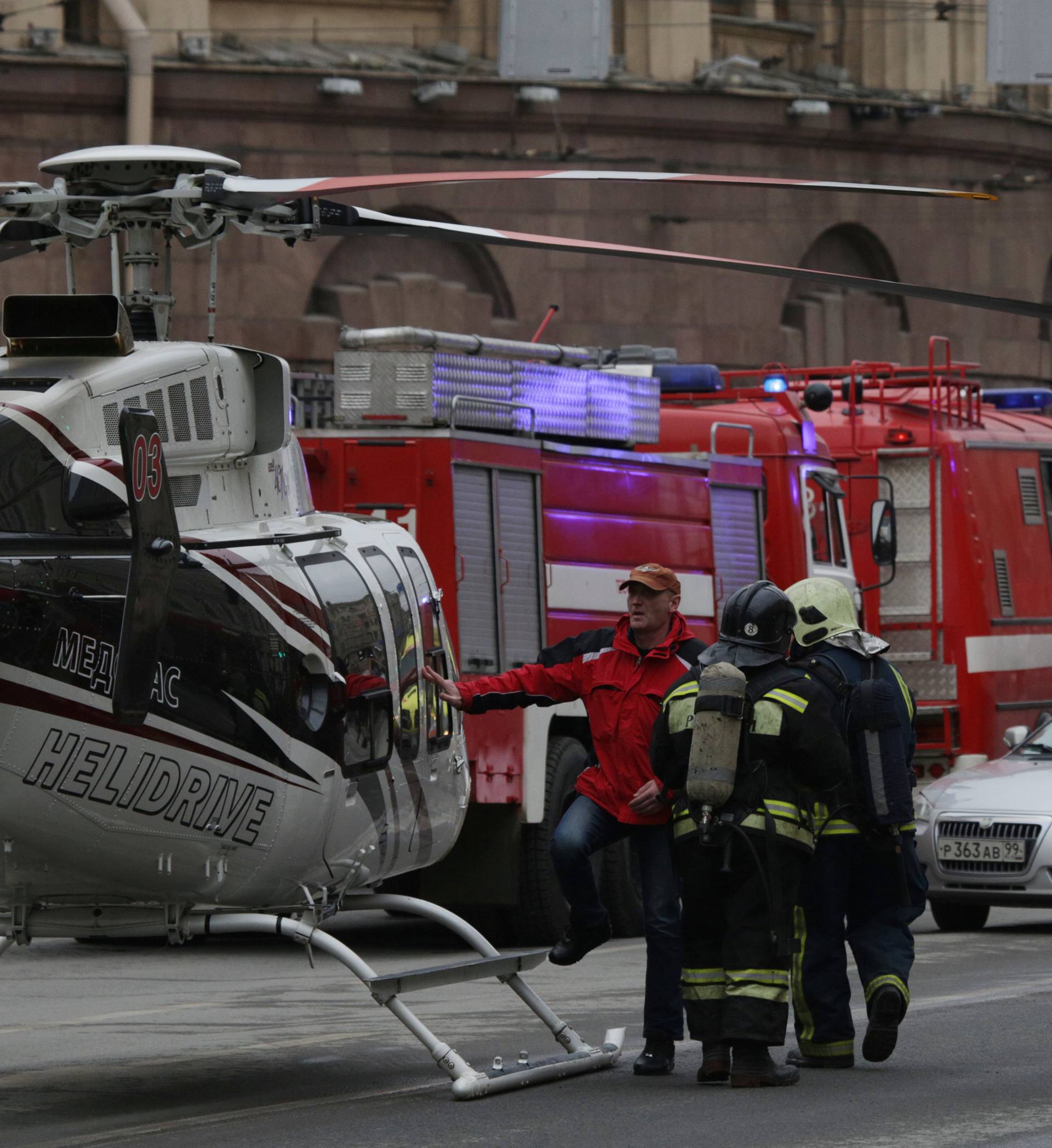 General view of emergency services attending the scene outside Sennaya Ploshchad metro station, following explosions in two train carriages in St. Petersburg