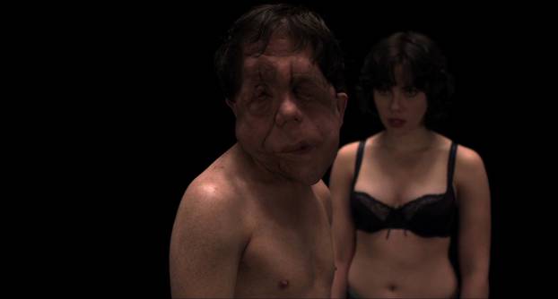 Adam Pearson and Scarlett Johansson