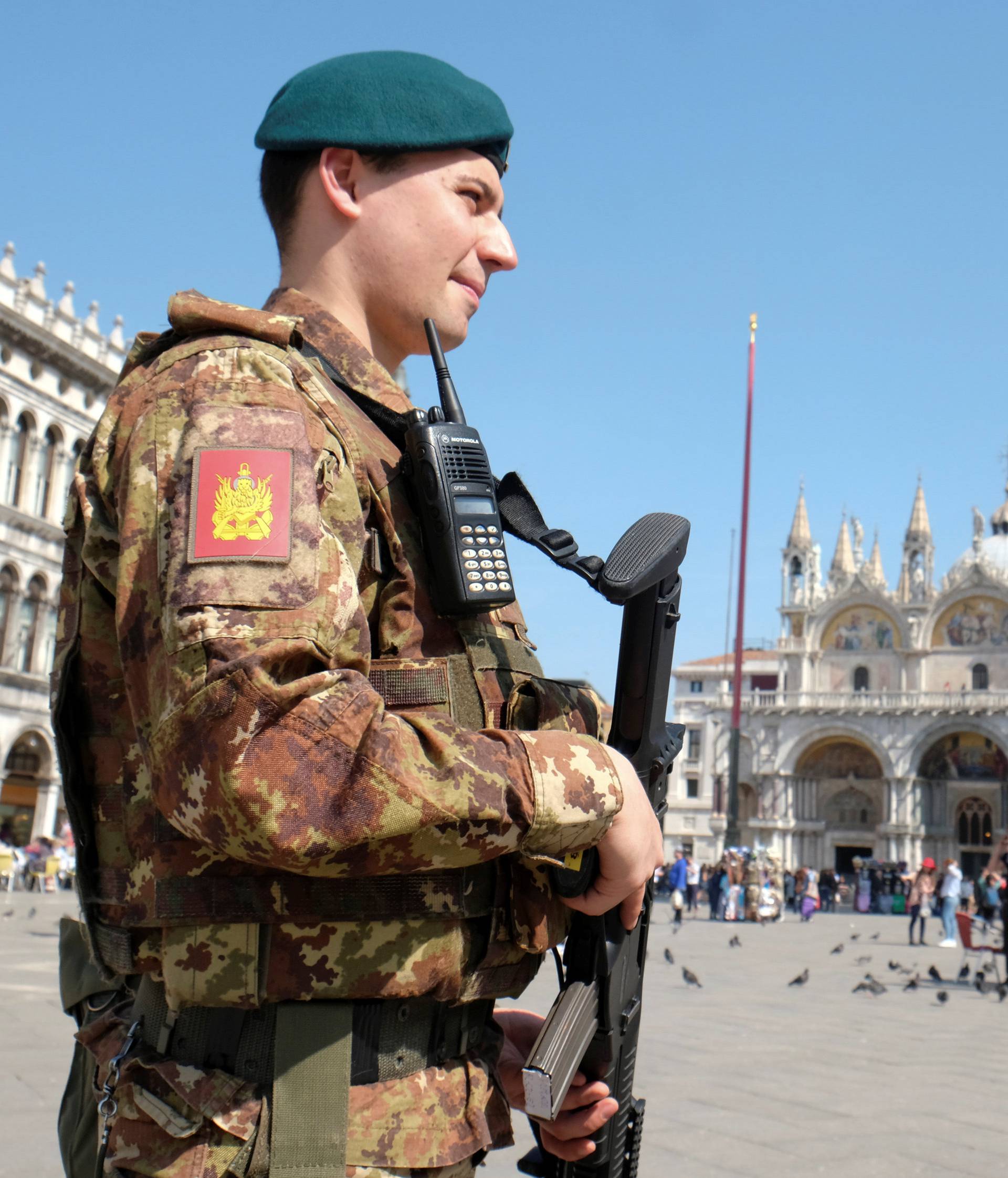 A soldier patrols Saint Mark's Square in Venice