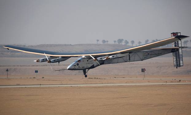 Solar Impulse 2, a solar powered plane piloted by Swiss aviator Andre Borschberg, is seen as it prepares to land at Cairo Airport