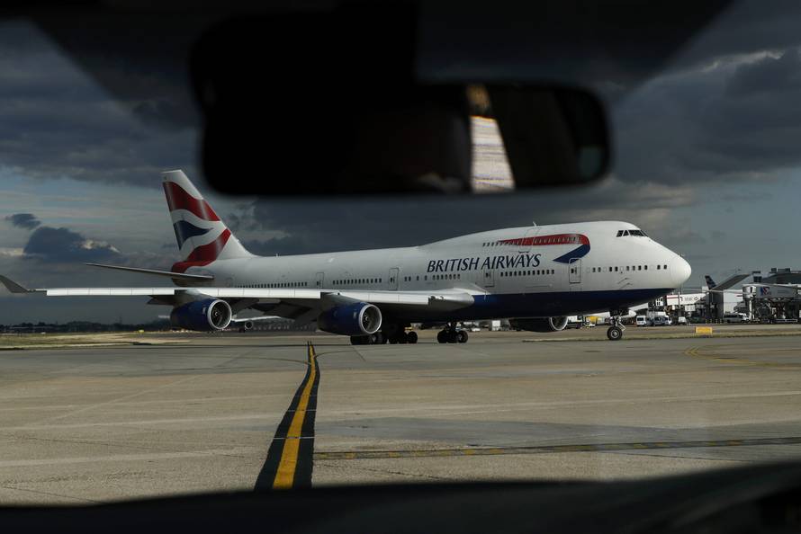 A British Airways aircraft taxis at Heathrow Airport near London