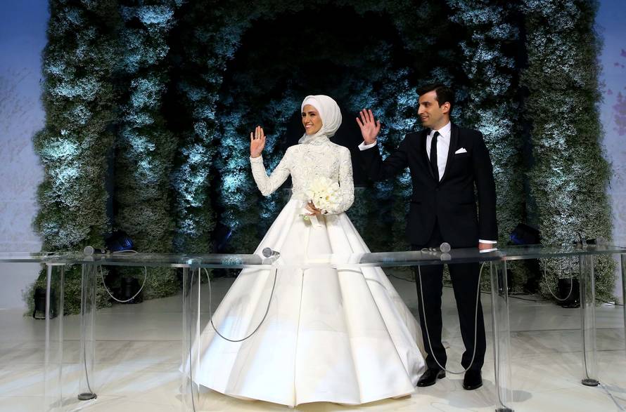 Sumeyye Erdogan, daughter of Turkish President Tayyip Erdogan, and her husband Selcuk Bayraktar are seen during their wedding ceremony in Istanbul