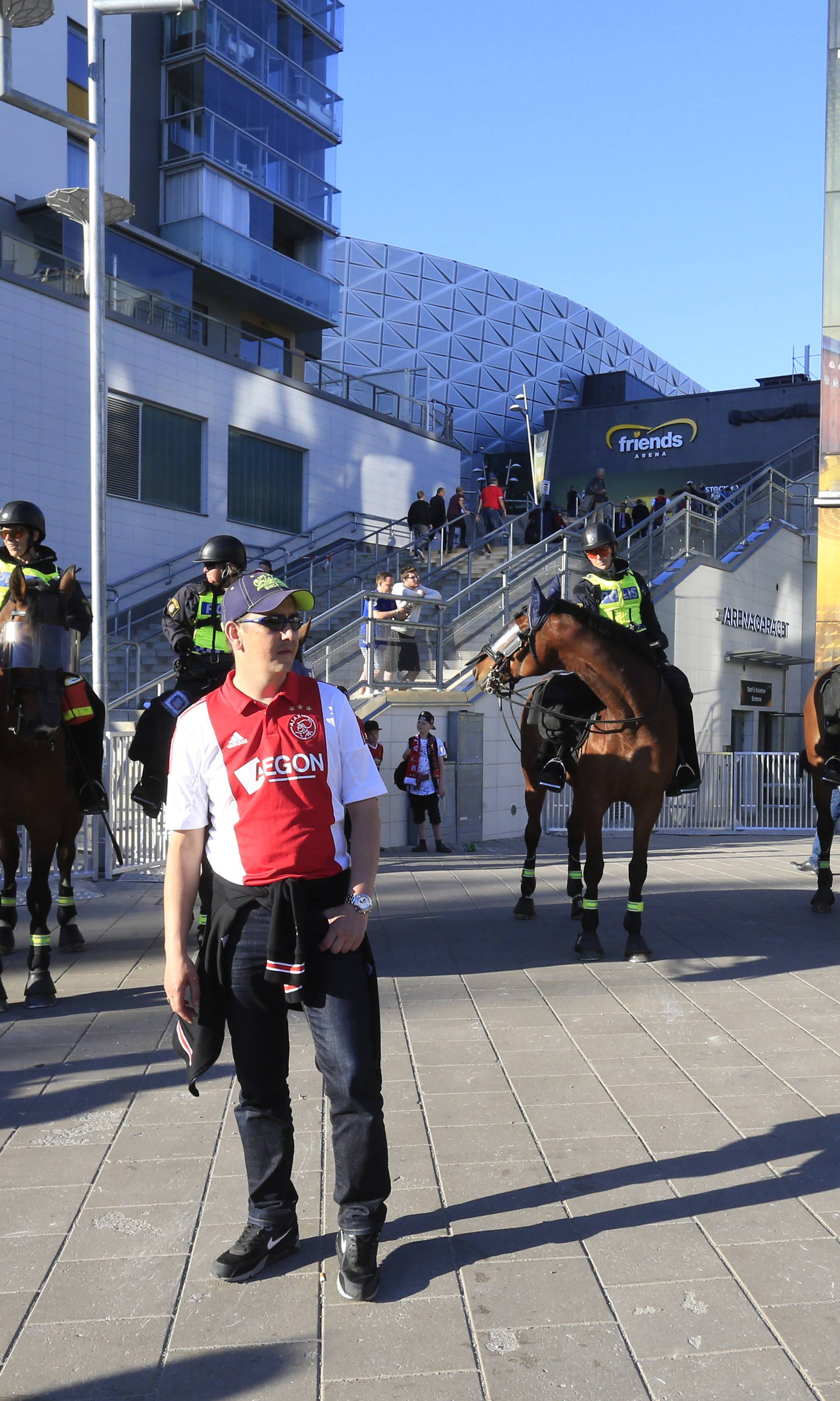 Mounted police and Ajax fans outside the stadium before the match