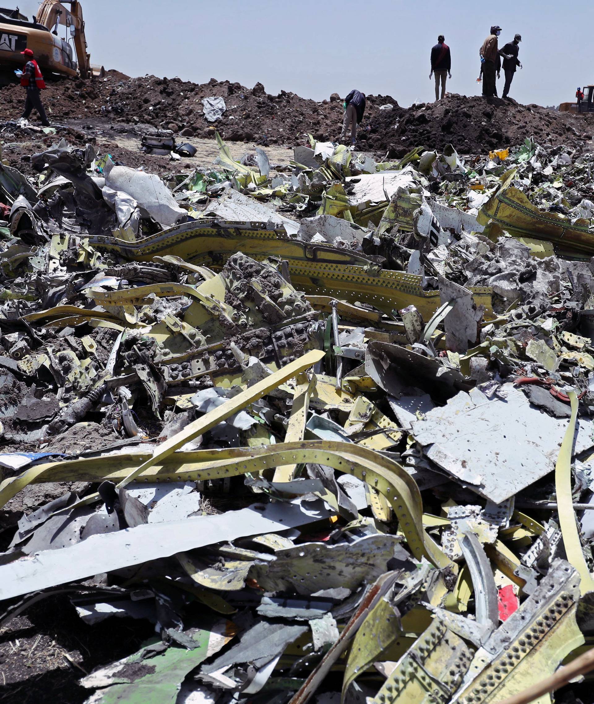 Wreckage is seen at the site of the Ethiopian Airlines Flight ET 302 plane crash near Bishoftu