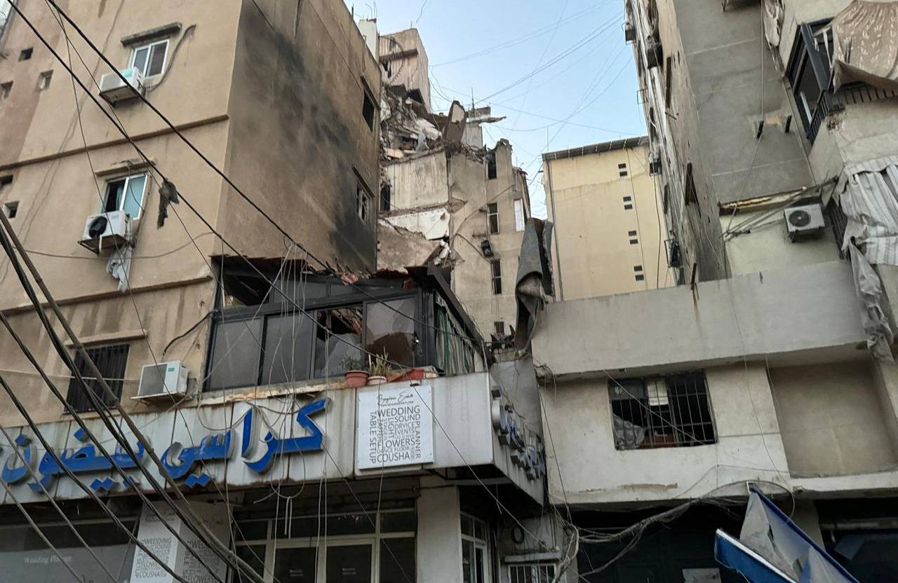 A view shows damage after what security sources said was a strike on Beirut's southern suburbs