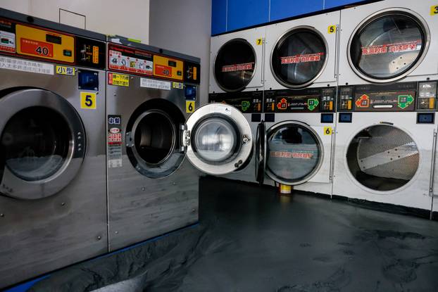 A damaged laundry shop, after flooding brought by Super Typhoon Ragasa, in Hualien