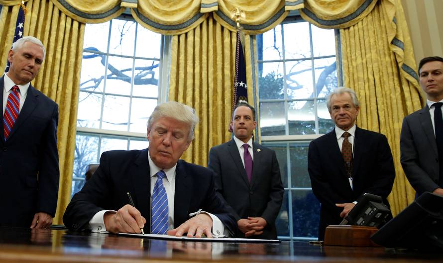 President Trump signs executive orders at the White House in Washington