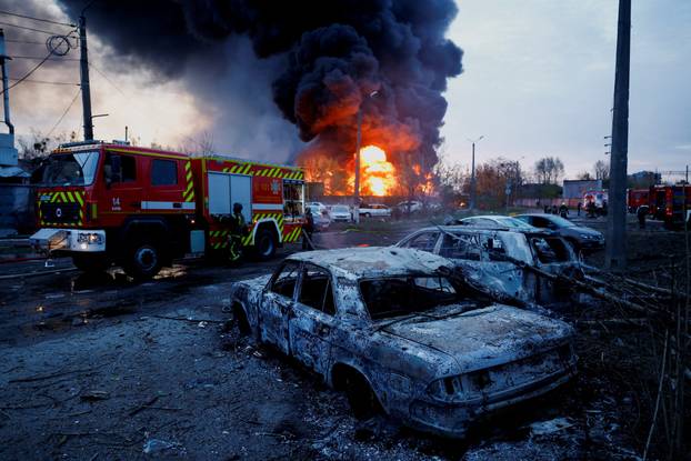 Rescuers work at the site of a Russian missile strike, amid Russia's attack on Ukraine, in Kyiv