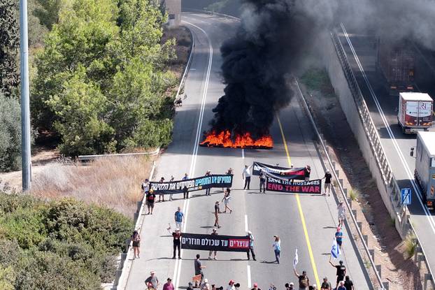 People block Israel's main highway connecting Jerusalem and Tel Aviv near Ben Shemen