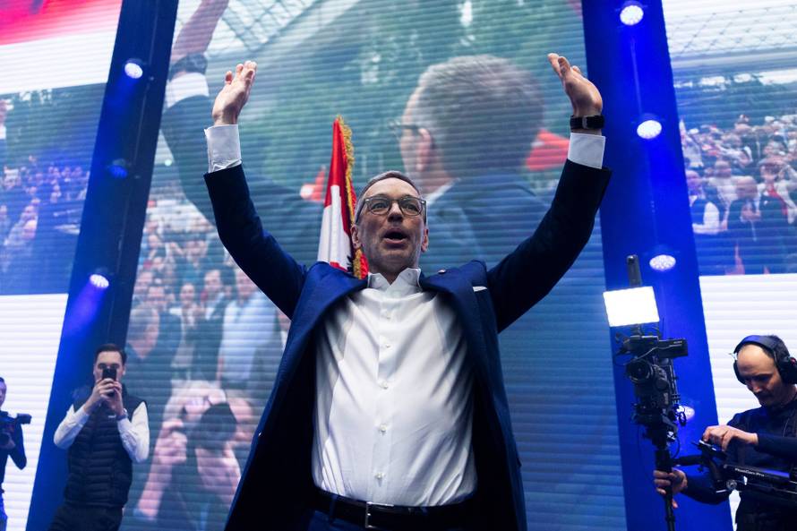 Far-right Freedom Party (FPO) leader Herbert Kickl gestures as he arrives at the annual new year's meeting of his party
