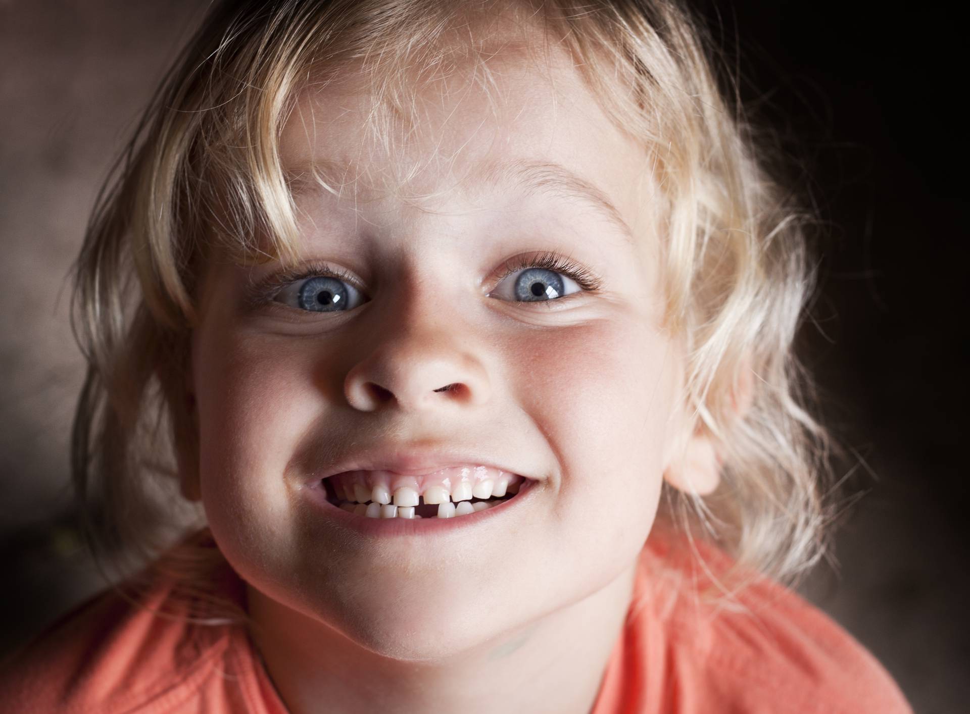 Child with missing tooth