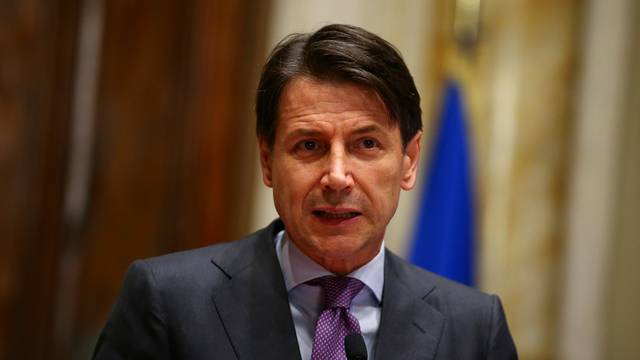 FILE PHOTO: Italy's newly appointed Prime Minister Giuseppe Conte speaks at the media at the end of a round of consultations with political parties at the Lower House in Rome