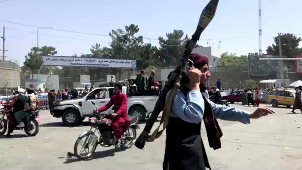 Shots fired as Taliban control crowd of Afghans outside Kabul airport