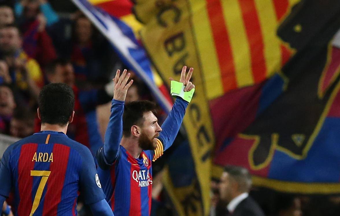 Barcelona's Lionel Messi celebrates after the game