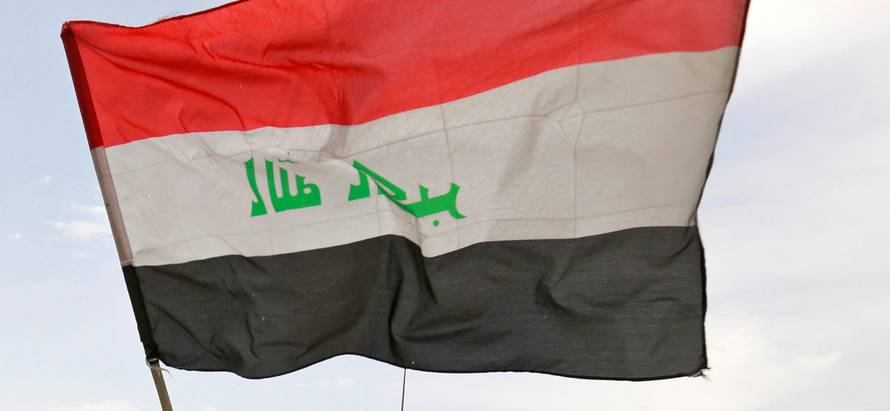 Iraqi Federal Police celebrate in the Old City of Mosul