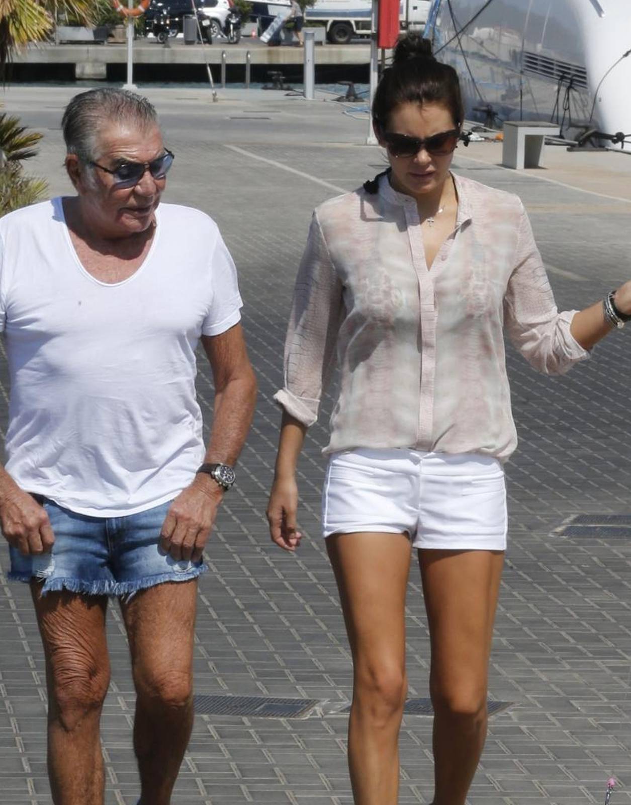 Roberto Cavalli And Girlfriend Walk Their Dogs - Ibiza