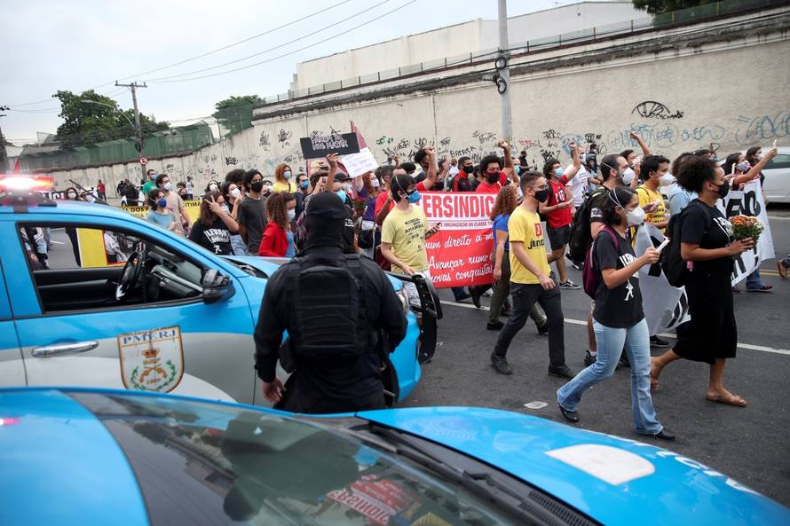 People protest against police violence outside Jacarezinho slum after a police operation which resulted in 25 deaths in Rio de Janeiro