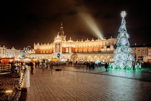 Fair in KRAKOW. Main Market Square and Sukiennice in the evening.