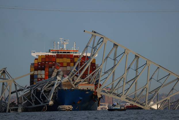 Emergency personnel work at the scene of the Francis Scott Key Bridge collapse in Baltimore