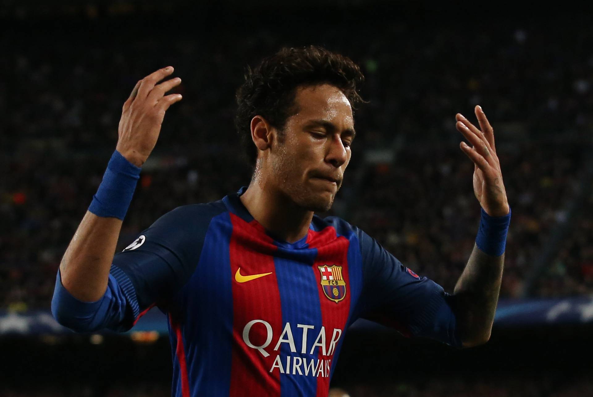 Barcelona's Neymar reacts