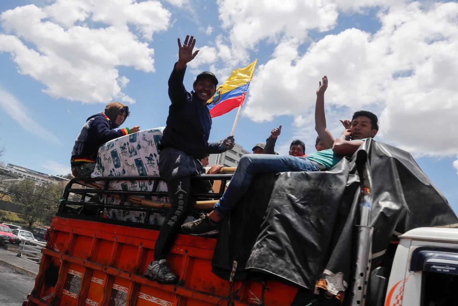 Indigenous people embrace in the aftermath of the last days' protests in Quito