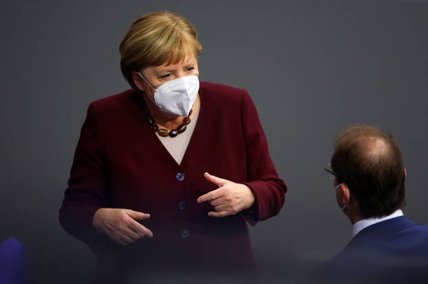 German Chancellor Angela Merkel delivers a speech on the government