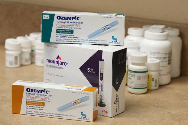 FILE PHOTO: Ozempic and Mounjaro are displayed in a pharmacy in Provo