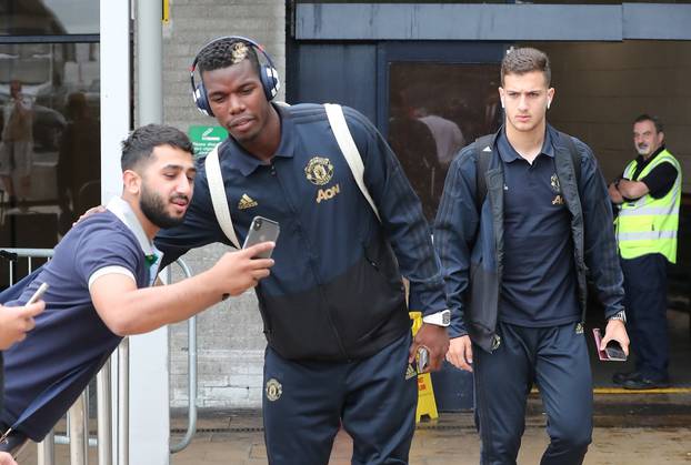Manchester United team arrive in the UK after their UEFA Champsions League match