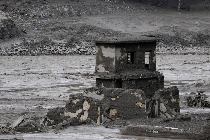 A mud-covered building following a flash flood at Trishuli, Nepal
