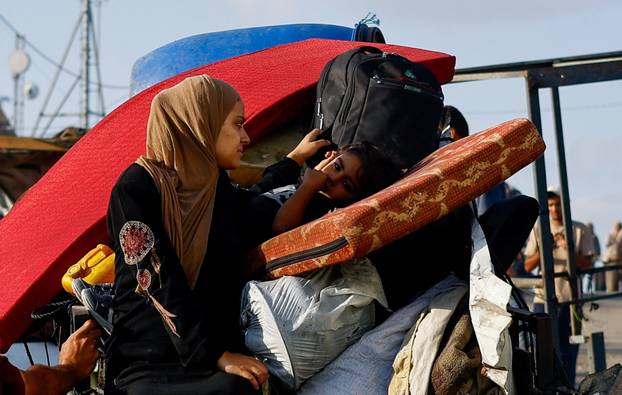 Displaced Palestinians fleeing northern Gaza due to Israeli operation move southward, in Gaza Strip