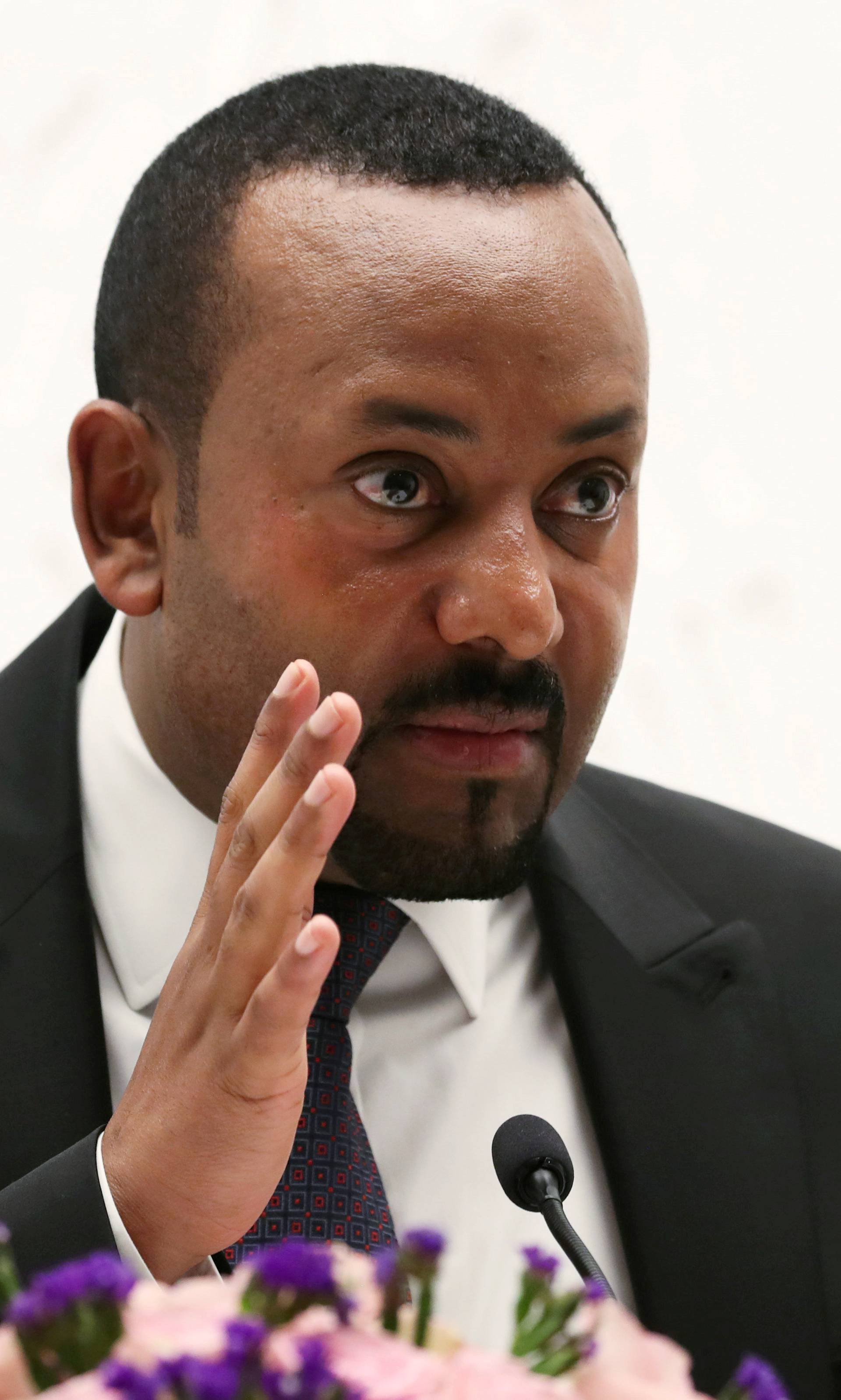 FILE PHOTO: Ethiopia's Prime Minister Abiy Ahmed speaks at a news conference at his office in Addis Ababa