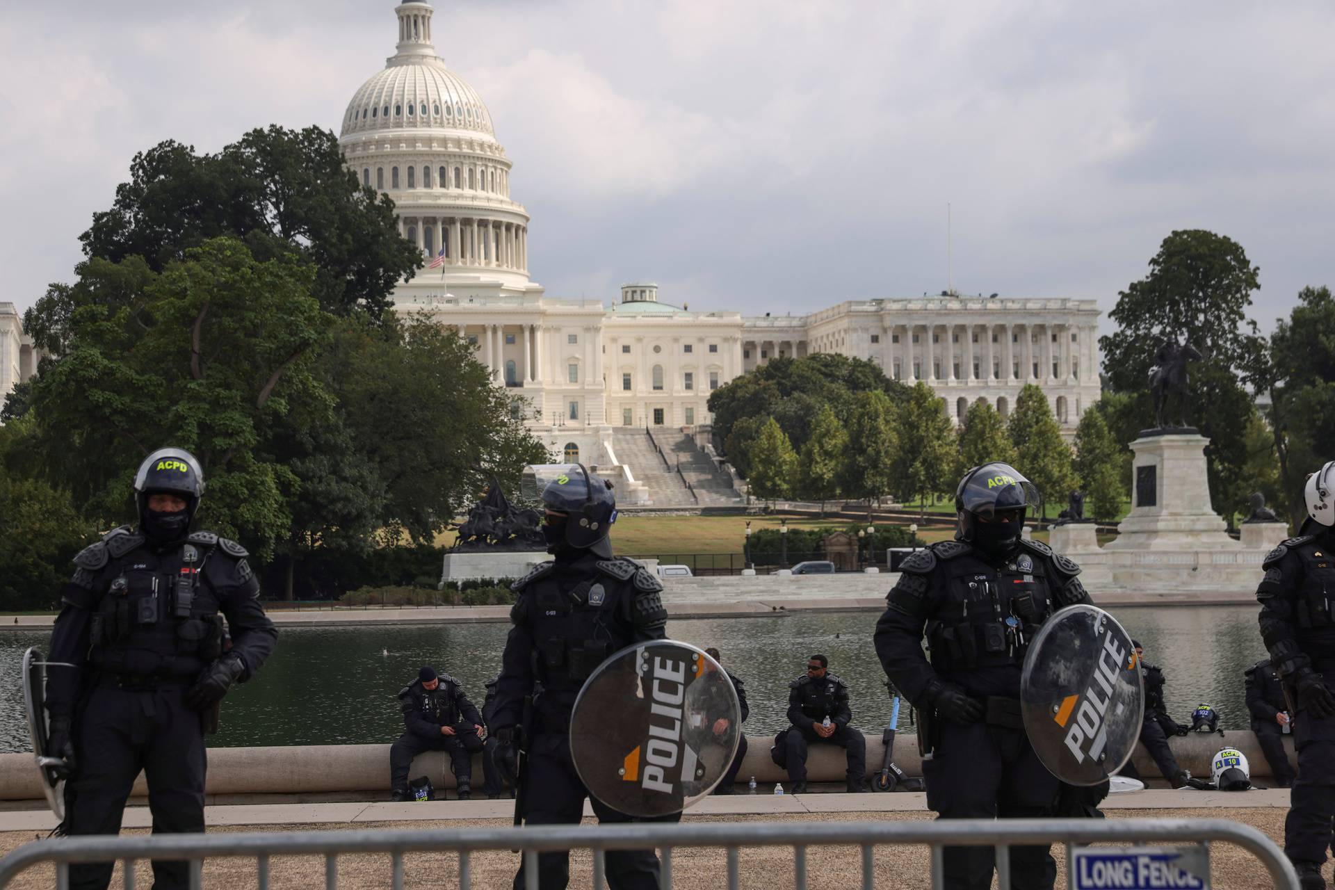 Demonstrators rally in support of January 6 defendants at protest near the U.S. Capitol in Washington