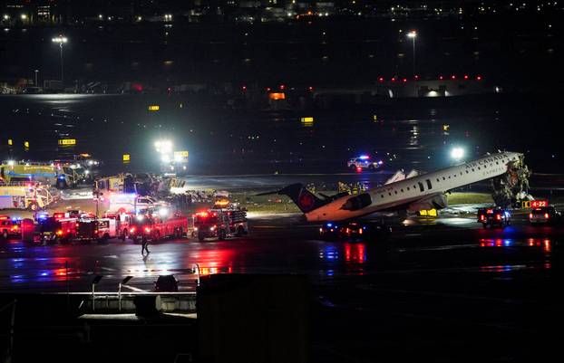 Air Canada Express jet collides with a ground vehicle at LaGuardia airport