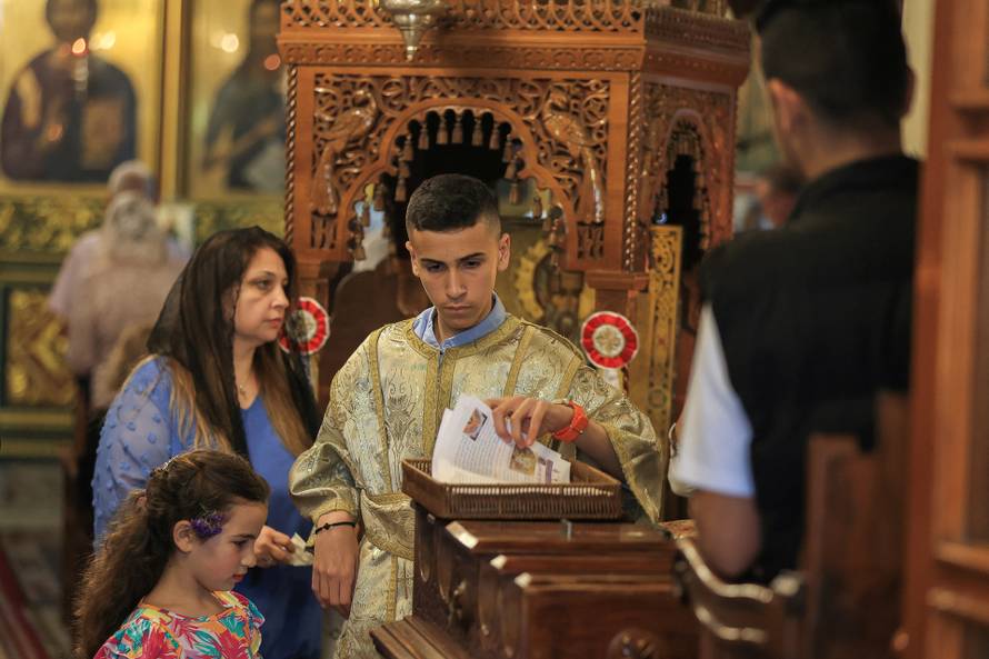 Easter Mass at the Greek Orthodox Saint Porphyrius Church, in Gaza City