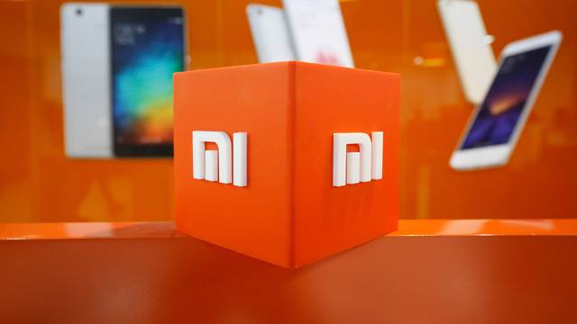FILE PHOTO: FILE PHOTO: The logo of Xiaomi is seen inside the company's office in Bengaluru