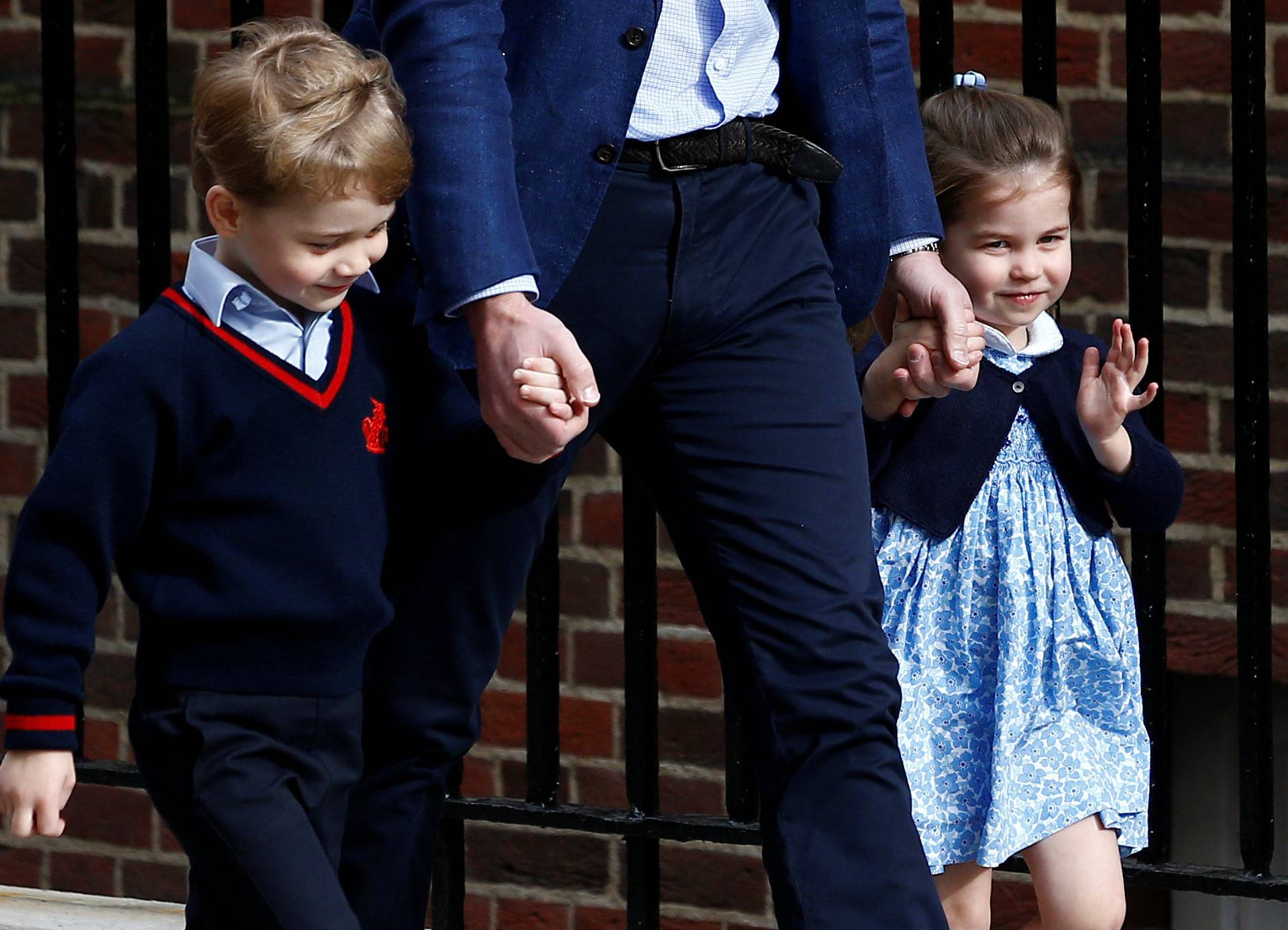 Britain's Prince William arrives at the Lindo Wing of St Mary's Hospital with his children Prince George and Princess Charlotte after his wife Catherine, the Duchess of Cambridge, gave birth to a son, in London