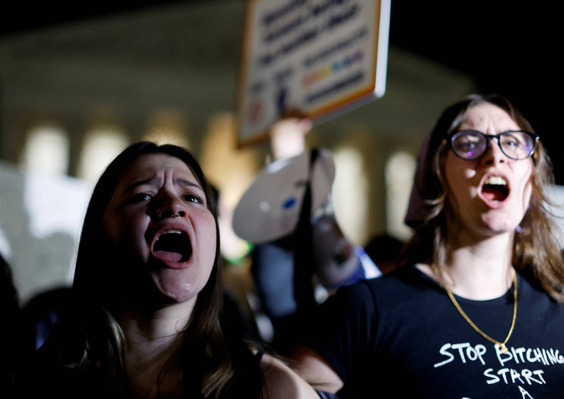 Protesters react outside the U.S. Supreme Court after the leak of a draft opinion preparing for a majority of the court to overturn the Roe v. Wade abortion rights decision in Washington