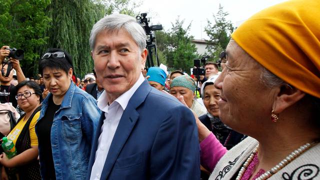 FILE PHOTO: Kyrgyz former President Atambayev, who was stripped of legal immunity after a parliamentary vote, and his supporters attend a rally in Bishkek