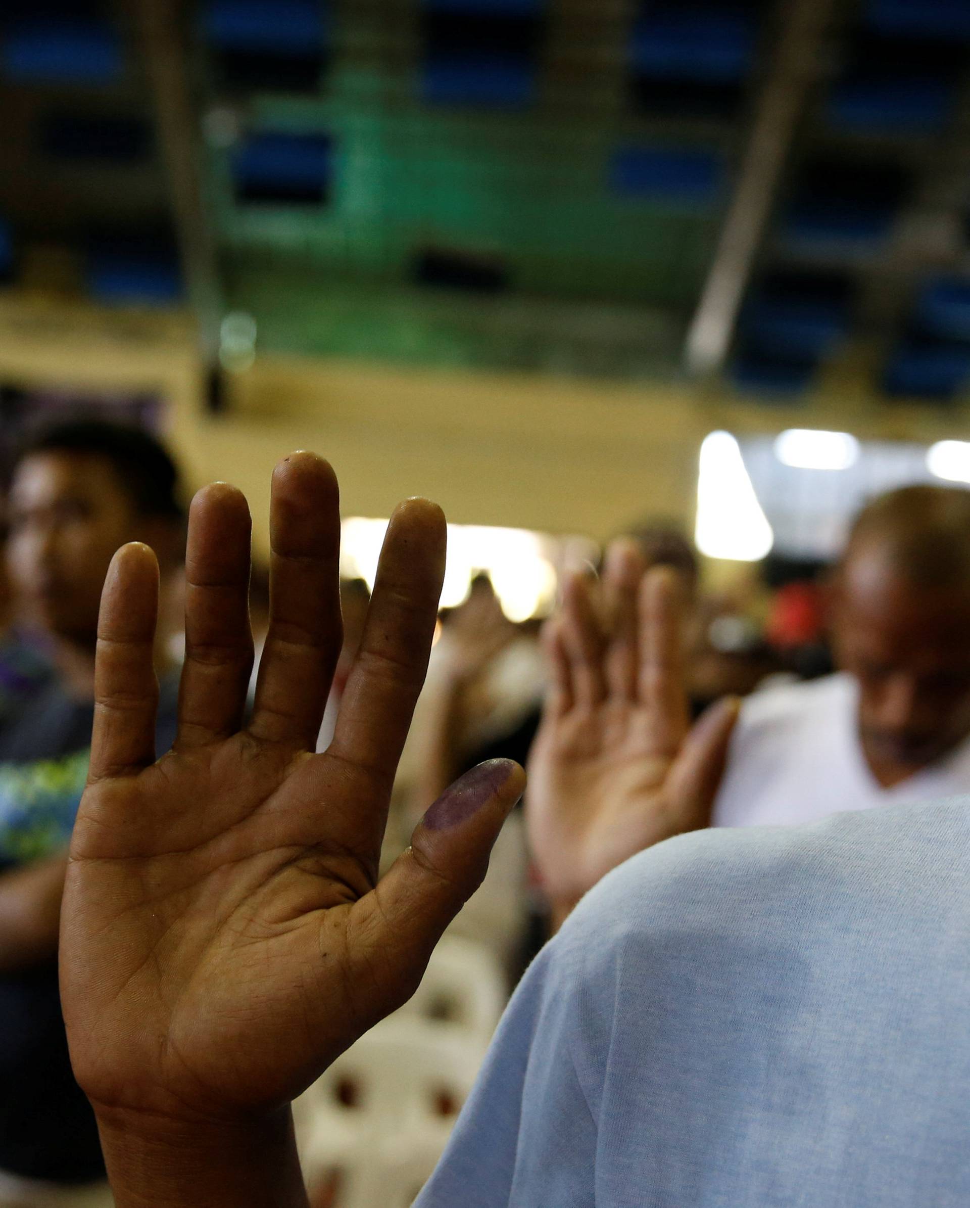Drug users and pushers take their oath, that they will not be involved in drugs again,  after they surrendered to local officials as they follow a government campaign against drugs in Tanauan Batangas, south of Manila