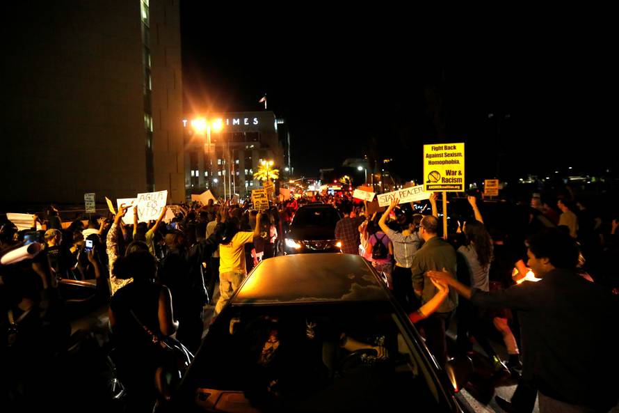 People march as they protest the election of Republican Donald Trump as the president of the United States in downtown Los Angeles