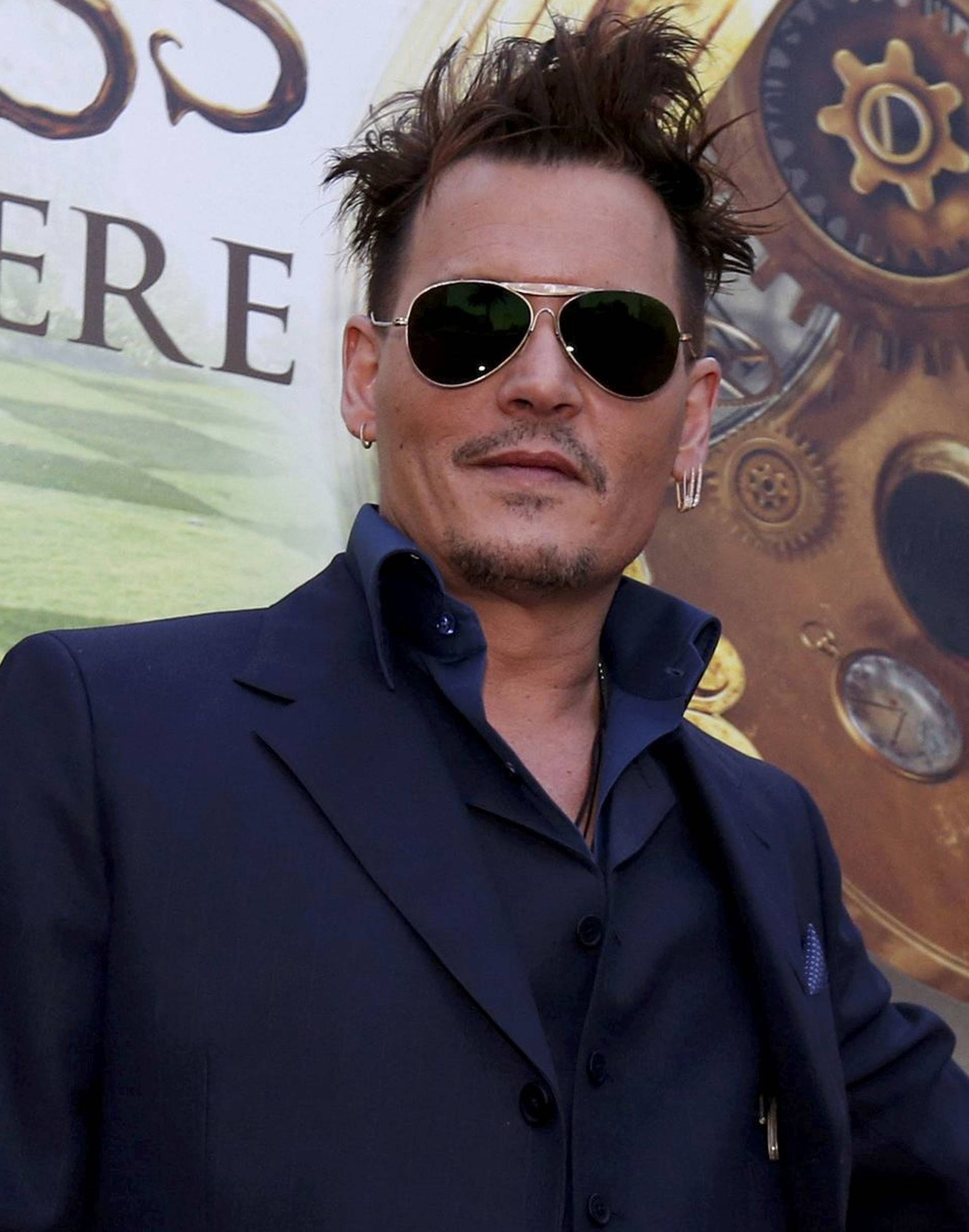 FILE PHOTO -  Cast member Depp poses at the premiere of "Alice Through the Looking Glass" at El Capitan theatre in Hollywood