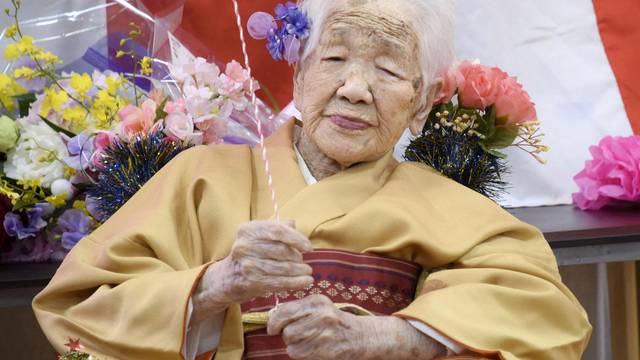 FILE PHOTO: Kane Tanaka, born in 1903, smiles as a nursing home celebrates three days after her 117th birthday in Fukuoka