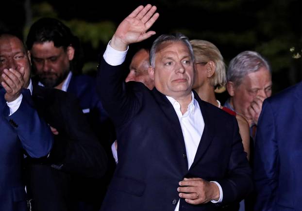 Hungarian Prime Minister Viktor Orban addresses supporters after the preliminary results of the European Parliament election in Budapest