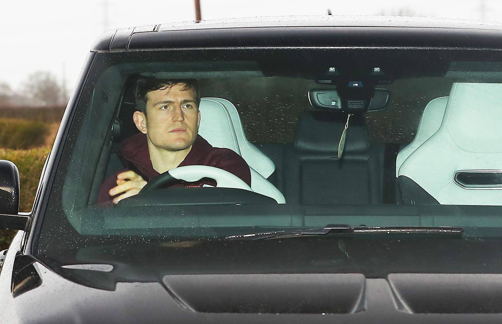 Manchester United players arrive for a training session - The AON Carrington Training Complex