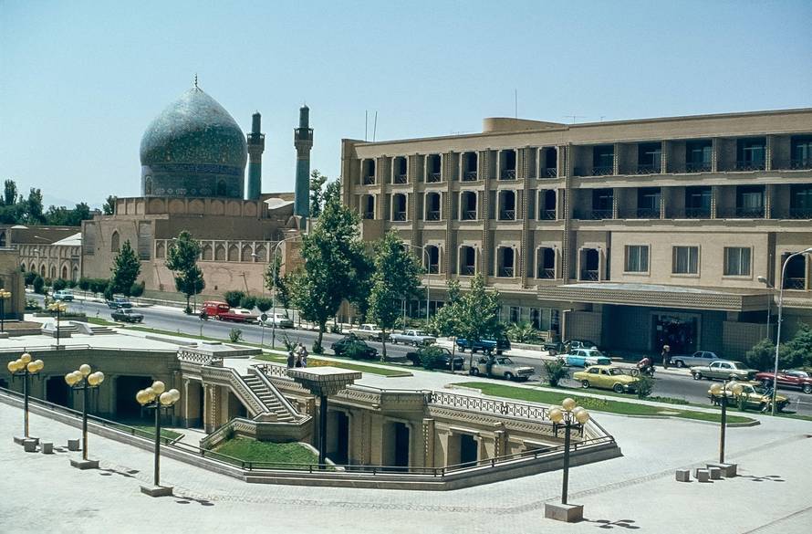 This cityscape image looking towards the Madresse Madac-I-Shah mosque and school and the Chahar Bagh Avenue is one of the main roads in the cultural city of Isfahan as it was in 1978